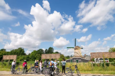 Countryside bike tour with windmill, cheese and clogs